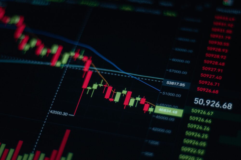 loans against stock. Close-up of stock market chart showing trends and data on a digital screen.
