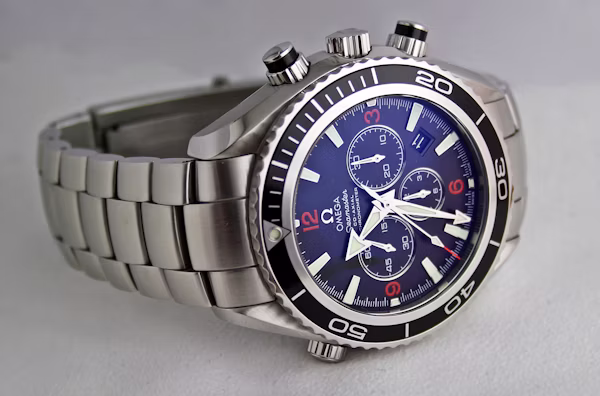 loans against watches - silver luxury watch with blue face